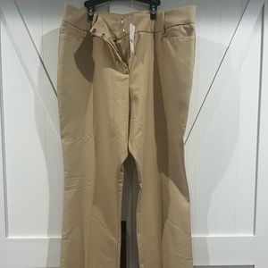 New tan pants with slight bootcut leg - flat front with pockets